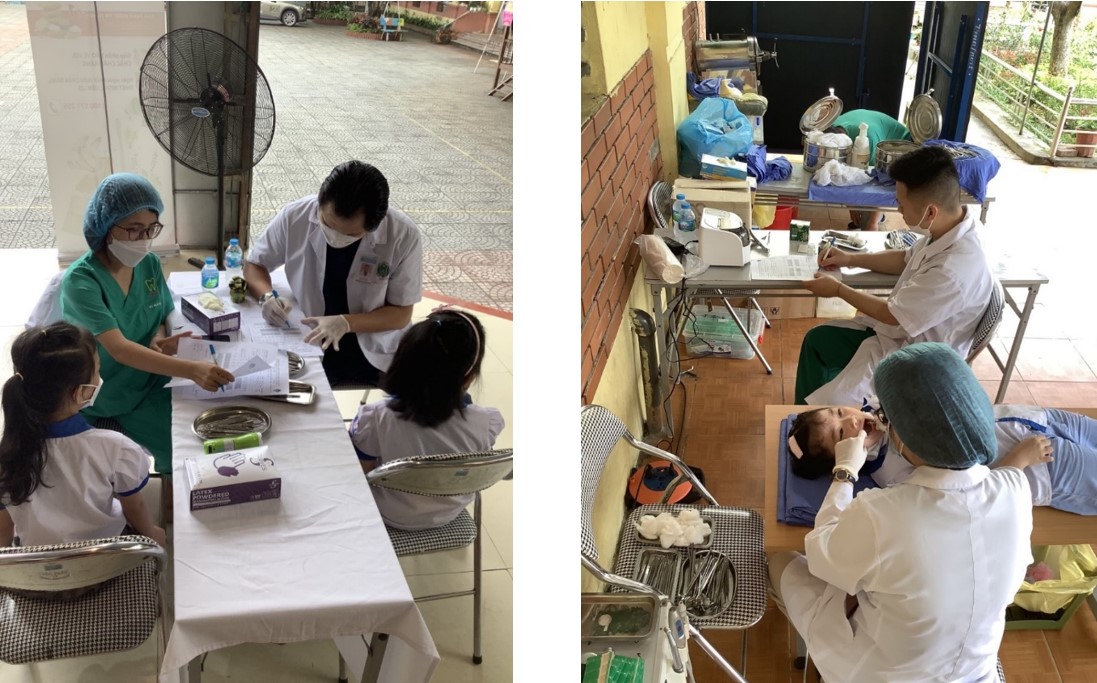 Các bác sĩ của BV RHM TW HN khám răng cho các em học sinh